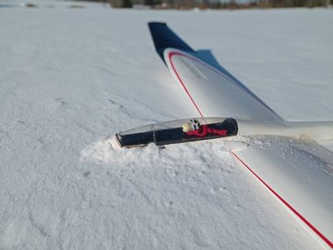 Snoopy pilot Aquila snow winter sunny
