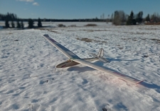 Pilot Tommy Glider, snowy field